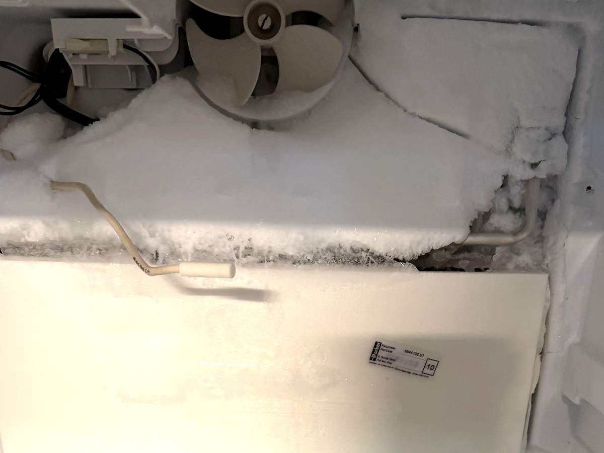 Liebherr evaporator panel removed to replace the defrost system and evaporator fan